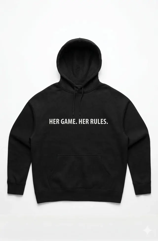 A black hoodie printed with HER GAME. HER RULES. across the chest